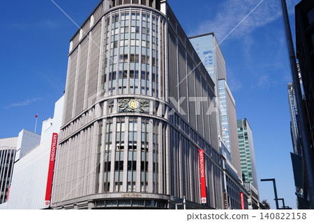Mitsukoshi Main Store and the blue sky from the Nihonbashi North Intersection Mitsukoshi Main Store and the blue sky from the Nihonbashi North Intersection 140822158