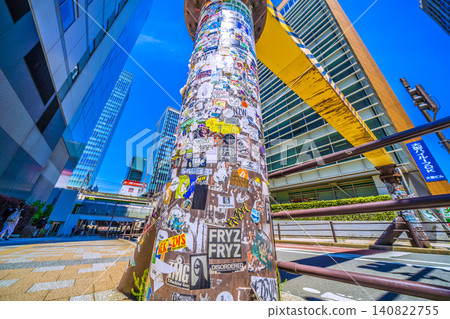 Inbound tourism continues to thrive in Tokyo's urban landscape… Akihabara, Tokyo. Pillars of height restriction bars are covered in stickers. Inbound tourism continues to thrive in Tokyo's urban landscape… Akihabara, Tokyo. Pillars of height restriction bars are covered in stickers. 140822755