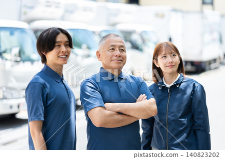 A delivery company staff member looks up at the sky. A delivery company staff member looks up at the sky. 140823202