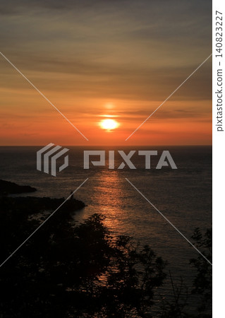 A spectacular view of the Sea of Okhotsk at sunset from Shiretoko Sunset Hill. A spectacular view of the Sea of Okhotsk at sunset from Shiretoko Sunset Hill. 140823227