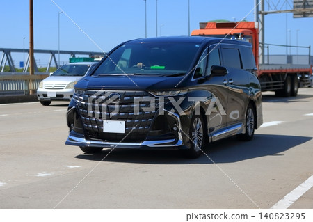 Luxury minivan in motion Luxury minivan in motion 140823295