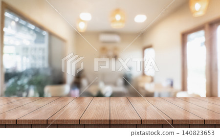 Empty wooden table top with lights bokeh on blur restaurant background.	 140823653