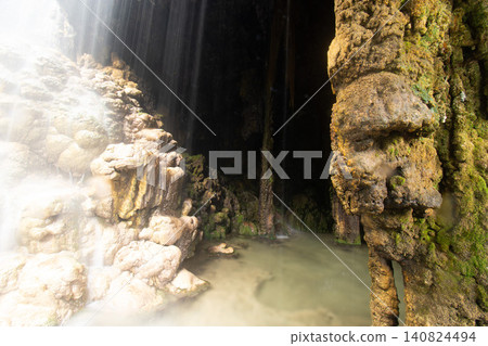 Clear water pool inside Goa Tetes limestone cave at Tumpak Sewu canyon Indonesia Clear water pool inside Goa Tetes limestone cave at Tumpak Sewu canyon Indonesia 140824494