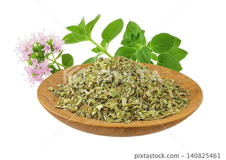 Oregano or marjoram leaves fresh and dry in wooden bowl isolated on white background Oregano or marjoram leaves fresh and dry in wooden bowl isolated on white background 140825461