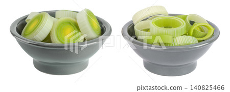 sliced Leek vegetable in ceramic bowl isolated on white background with full depth of field 140825466