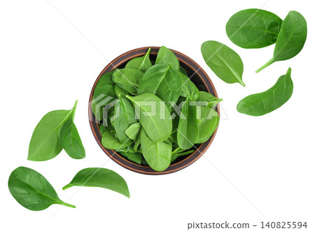Baby spinach leaves in ceramic bowl isolated on white background. Top view. Flat lay Baby spinach leaves in ceramic bowl isolated on white background. Top view. Flat lay 140825594