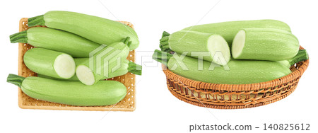 zucchini or marrow in a wicker basket isolated on white background with full depth of field. Top view. Flat lay zucchini or marrow in a wicker basket isolated on white background with full depth of field. Top view. Flat lay 140825612