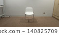 Minimalist conference room background with white chairs and ample white space. 140825709