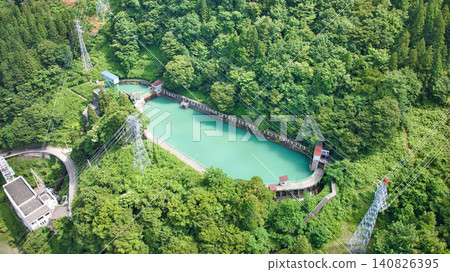 A water tank for hydroelectric power generation located in the Unazuki district of Toyama Prefecture, Japan. A water tank for hydroelectric power generation located in the Unazuki district of Toyama Prefecture, Japan. 140826395