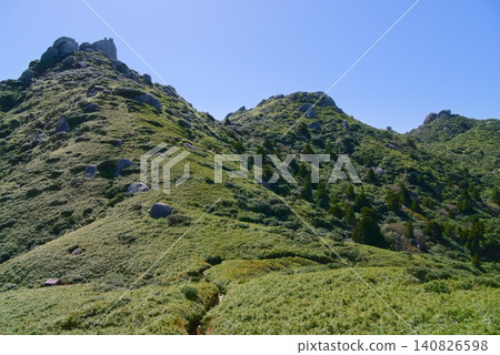 View of Mt. Okina, Mt. Awa, and Mt. Toseki from the middle of Mt. Kurio on Yakushima Island in Kagoshima Prefecture. 140826598