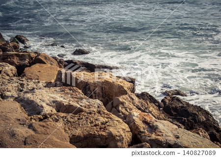 Waves crashing against the rocky coastline with a view of the Mediterranean Sea in Tel Aviv Waves crashing against the rocky coastline with a view of the Mediterranean Sea in Tel Aviv 140827089