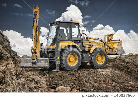 The loader operates on a construction site moving dirt and gravel during the day under a cloudy sky. It is available for rent for various projects The loader operates on a construction site moving dirt and gravel during the day under a cloudy sky. It is available for rent for various projects 140827660