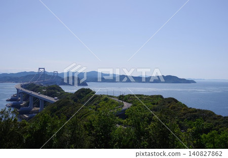 View of the Great Naruto Bridge and Shimada Island from Uzumachi Terrace in Minamiawaji City, Hyogo Prefecture. 140827862