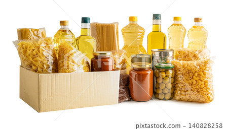 Foodstuffs in donation box isolated on white background for volunteer to help people. Foodstuffs in donation box isolated on white background for volunteer to help people. 140828258