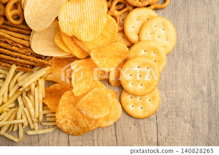 Mix of variety snack chips pretzel and cracker, junk crunchy food. Mix of variety snack chips pretzel and cracker, junk crunchy food. 140828265
