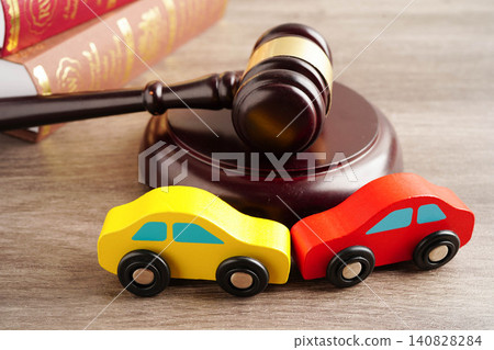 Car accident lawsuit and insurance, Judge hammer with car model. Car accident lawsuit and insurance, Judge hammer with car model. 140828284