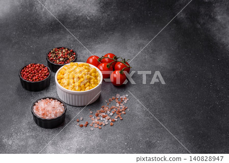 Golden, sweet canned corn kernels or maize for salads and vegetarian dishes. Canned corn Golden, sweet canned corn kernels or maize for salads and vegetarian dishes. Canned corn 140828947