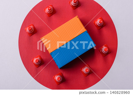 The cargo container ban on the japanese flag as a conceptual backdrop. The cargo container embargo The cargo container ban on the japanese flag as a conceptual backdrop. The cargo container embargo 140828960