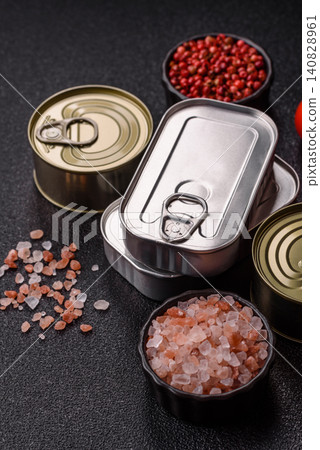 A metal tin can of meat, fish, or dog or cat food. A tin can of food 140828961