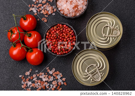 A metal tin can of meat, fish, or dog or cat food. A tin can of food 140828962