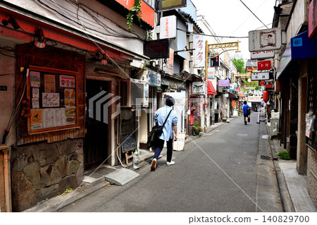Shinjuku Golden Gai on a festival day, with a noticeable number of foreign tourists. 140829700