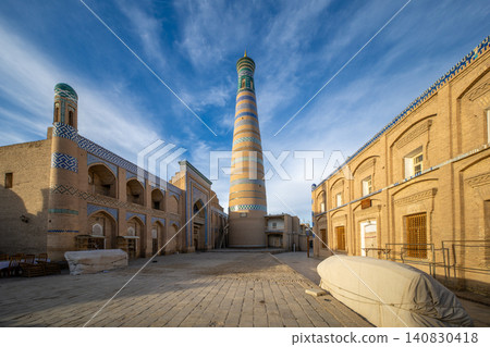 The Islamic Khodja Minaret, towering over Ichan Kala, a UNESCO World Heritage Site in Khiva, Uzbekistan. The Islamic Khodja Minaret, towering over Ichan Kala, a UNESCO World Heritage Site in Khiva, Uzbekistan. 140830418