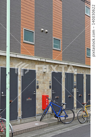 Modern apartment complexes harmonize with the Yanaka, Nezu, and Sendagi neighborhood, creating a modern apartment and everyday life with bicycles. Modern apartment complexes harmonize with the Yanaka, Nezu, and Sendagi neighborhood, creating a modern apartment and everyday life with bicycles. 140830622