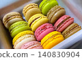Colorful macarons lined up in a box 140830904