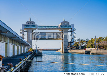 View of the large observation sluice gate "Viewo" at Numazu Port in Numazu City, Shizuoka Prefecture. 140831177
