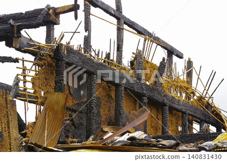 Wooden houses severely damaged by fire Wooden houses severely damaged by fire 140831430