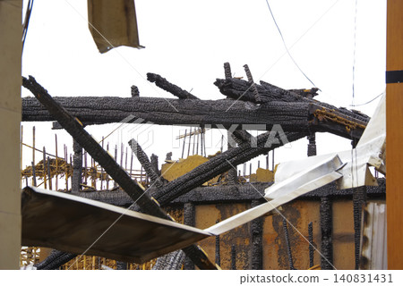 Wooden houses severely damaged by fire 140831431