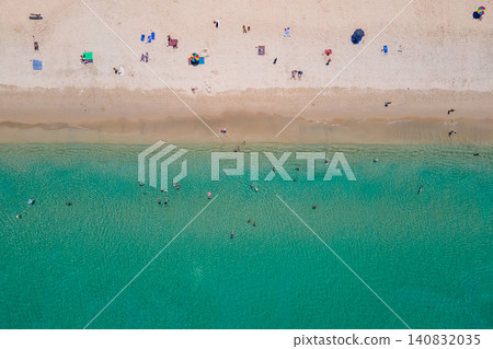 Aerial top view of summer activities on tropical beach landscape at Surin beach in Phuket, Thailand Aerial top view of summer activities on tropical beach landscape at Surin beach in Phuket, Thailand 140832035