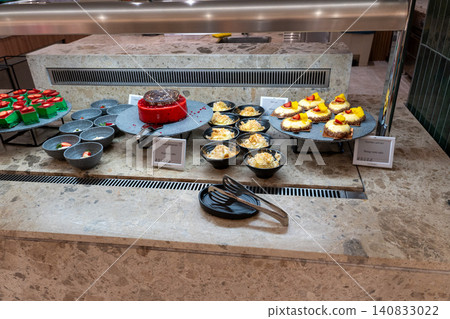 Assorted delicious cakes and pastries at luxury dessert buffet Assorted delicious cakes and pastries at luxury dessert buffet 140833022