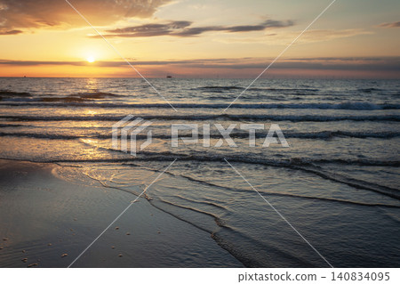 The setting sun over the sea The setting sun over the sea 140834095