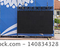 Large blank black outdoor LED display mounted on metal event truss 140834328
