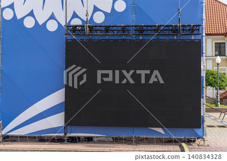 Large blank black outdoor LED display mounted on metal event truss Large blank black outdoor LED display mounted on metal event truss 140834328