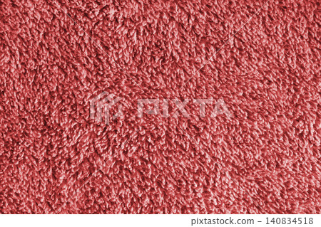 Macro of red microfiber bath towel, soft fluffy fabric, absorbent material texture background Macro of red microfiber bath towel, soft fluffy fabric, absorbent material texture background 140834518