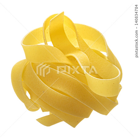 Tagliatelle pasta nest isolated on white background with clipping path, full depth of field Tagliatelle pasta nest isolated on white background with clipping path, full depth of field 140834784