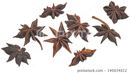 Star anise isolated on white background, falling aromatic dried spice for cooking and baking Star anise isolated on white background, falling aromatic dried spice for cooking and baking 140834812