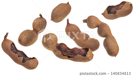 Tamarind pods isolated on white background with clipping path, exotic food ingredient 140834813