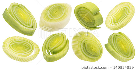 Fresh sliced leek isolated on white background, falling green onion rings, healthy salad ingredient Fresh sliced leek isolated on white background, falling green onion rings, healthy salad ingredient 140834839