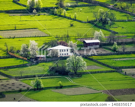 This image captures a rural landscape in springtime. This image captures a rural landscape in springtime. 140835017