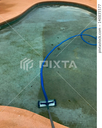 Cleaning swimming pool bottom with vacuum before and after Cleaning swimming pool bottom with vacuum before and after 140835577