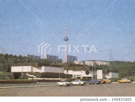 Vilnius, Lithuanian SSR, USSR - circa 1986: Exhibition Palace and television tower Vilnius, Lithuanian SSR, USSR - circa 1986: Exhibition Palace and television tower 140835805
