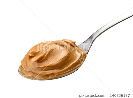 Spoon of Peanut Butter Isolated on White Background Spoon of Peanut Butter Isolated on White Background 140836187