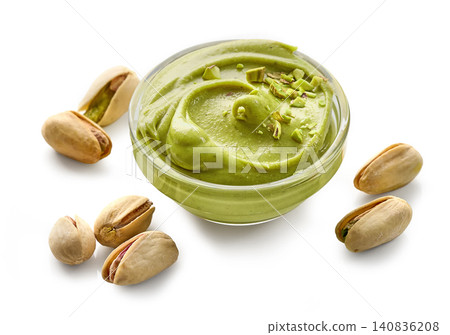 bowl of pistachio spread isolated on white background bowl of pistachio spread isolated on white background 140836208