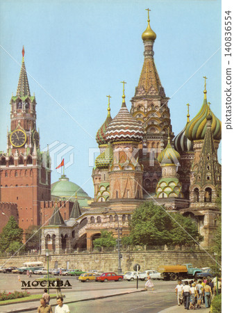 Moscow, Russian SFSR, USSR - January 1, 1983: St. Basil Cathedral and Spasskaya Tower Vintage Postcard Moscow, Russian SFSR, USSR - January 1, 1983: St. Basil Cathedral and Spasskaya Tower Vintage Postcard 140836554