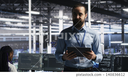 Data center manager presents machine learning hardware and predictive maintenance technology to investors. 140836612