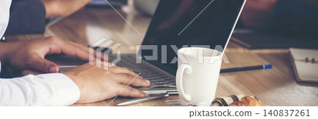 Banner Businesswoman reading financial graph charts business info with computer laptop. Panorama Women hands using laptop on office desk. Hands of business woman working office with copy space Banner Businesswoman reading financial graph charts business info with computer laptop. Panorama Women hands using laptop on office desk. Hands of business woman working office with copy space 140837261