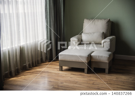 Cozy living room sofa couch home background with copy space. Warm home interior bright simple living space. Home showcase interior light bokeh furniture decor. Home furniture Blurry background Cozy living room sofa couch home background with copy space. Warm home interior bright simple living space. Home showcase interior light bokeh furniture decor. Home furniture Blurry background 140837266
